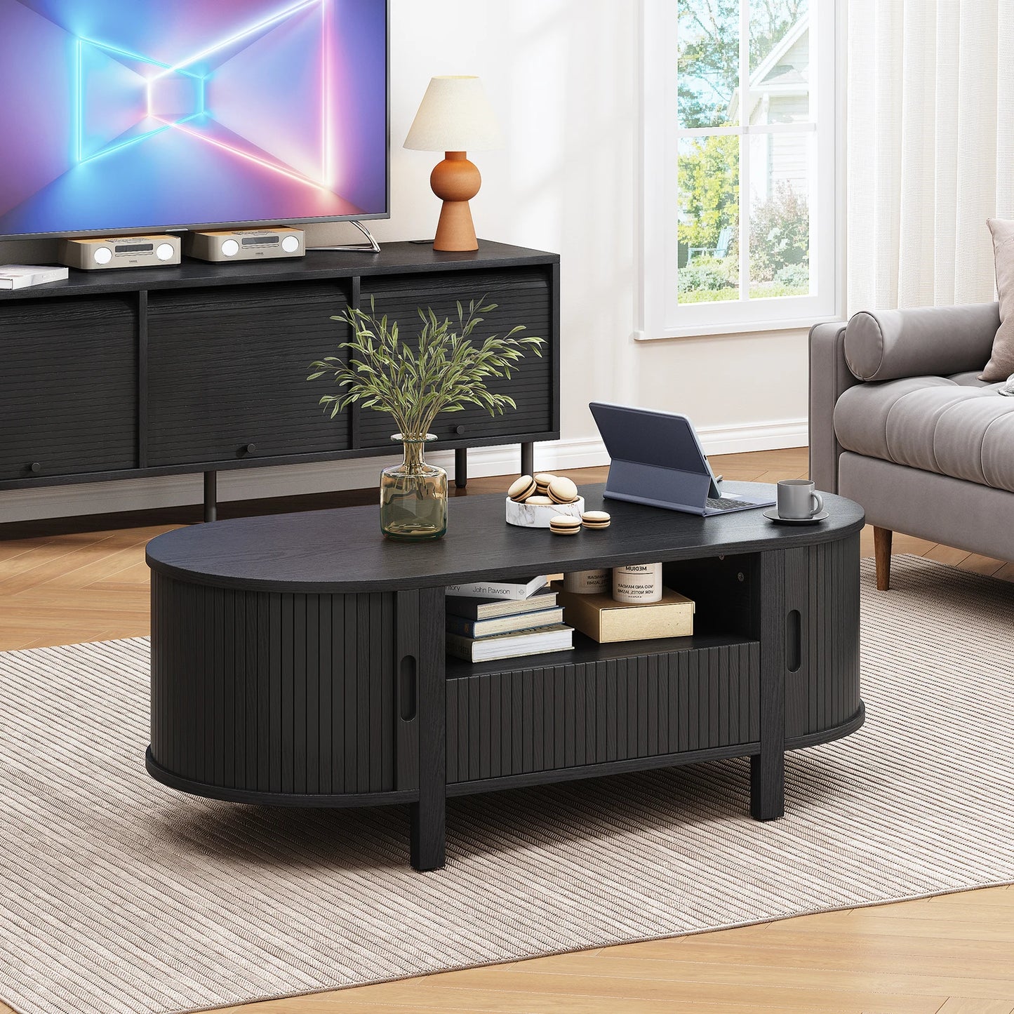 Oval Coffee Table With Storage Cabinets And Sliding Doors